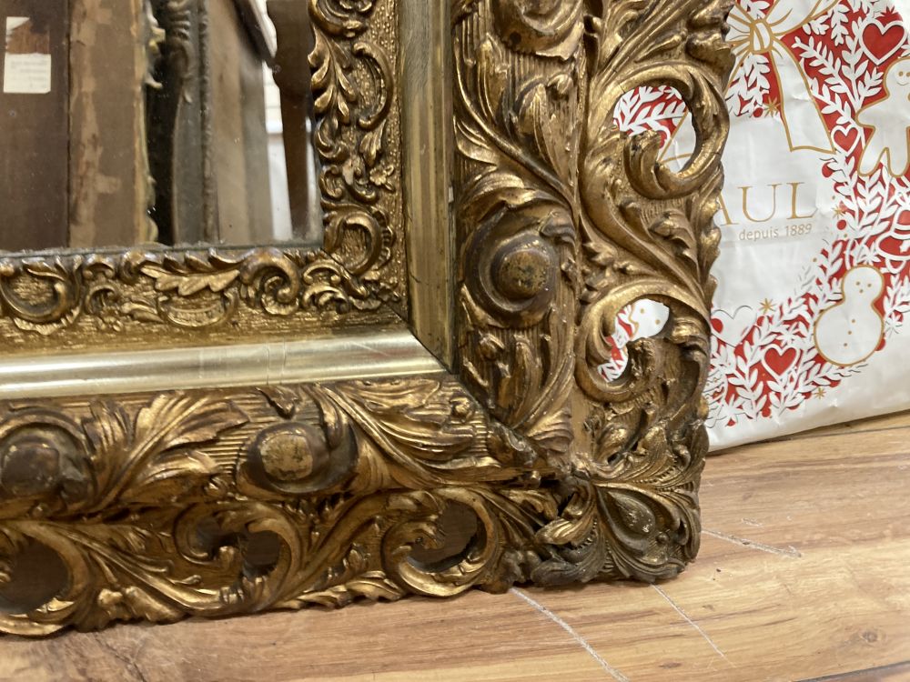 A giltwood and gesso wall mirror, width 84cm height 110cm